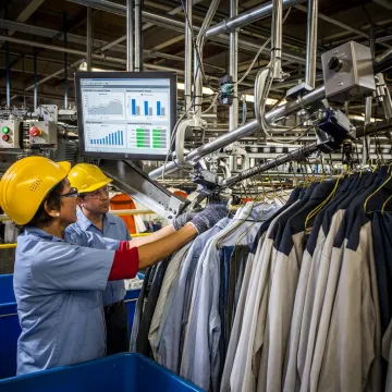 Engineers reviewing industrial analytics dashboards